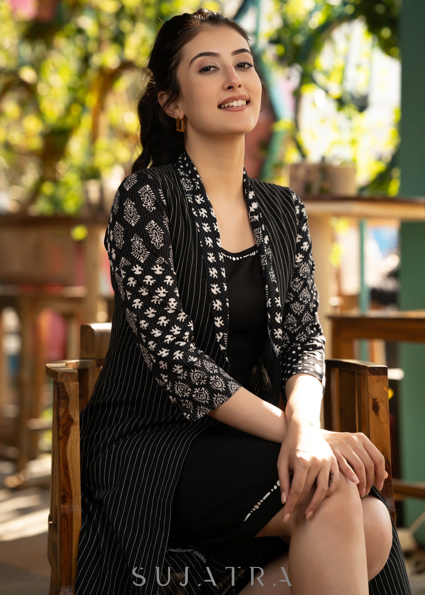 Black dress with striped front open jacket