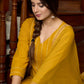 Graceful delicate mustard cotton kurta with a lace yoke and matching pants - Dupatta Optional