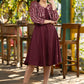 Trendy wine cotton flared dress paired with contrast ikat shrug