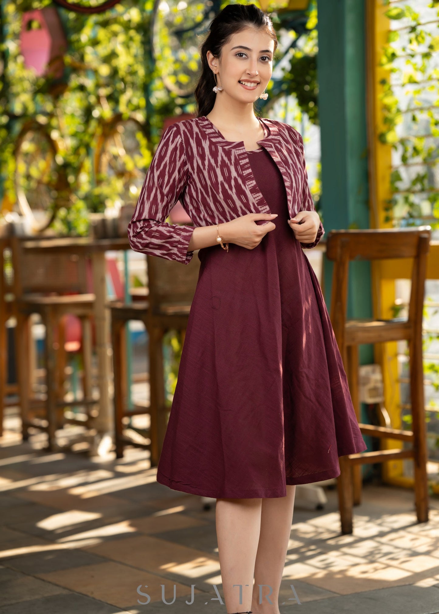 Trendy wine cotton flared dress paired with contrast ikat shrug