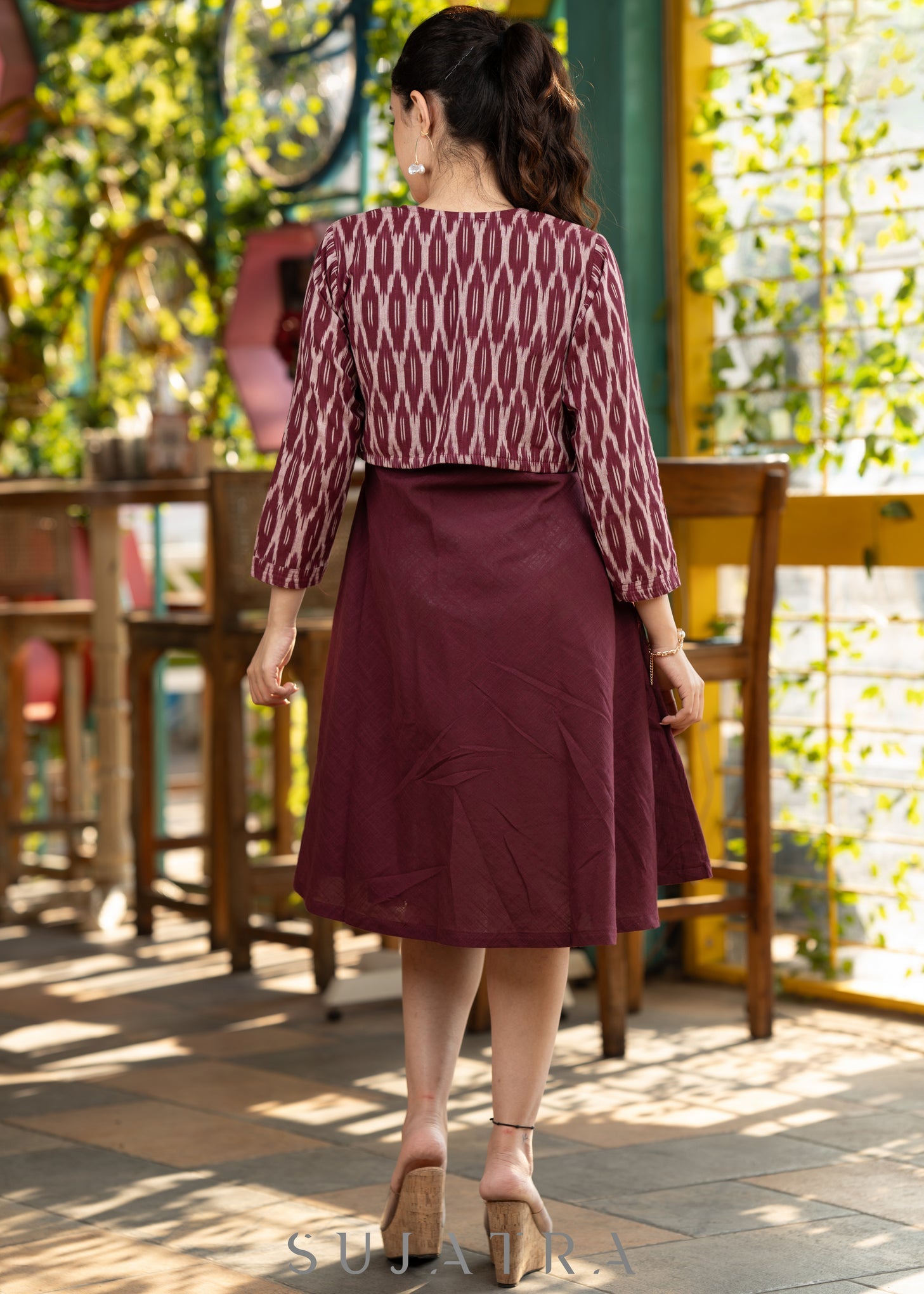 Trendy wine cotton flared dress paired with contrast ikat shrug