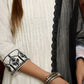 Elegant off-white cotton kurta adorned with intricate embroidery complimeted by matching pants - Dupatta Optional