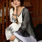 Elegant off-white cotton kurta adorned with intricate embroidery complimeted by matching pants - Dupatta Optional