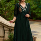 Elegance redefined in this captivating green georgette lace kurta and pant ensemble