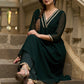 Elegance redefined in this captivating green georgette lace kurta and pant ensemble