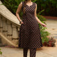 Casual and comfortable black ajrak sleeveless kurta with coordinated pants (Sleeves Provided) - Stole Optional