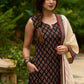 Casual and comfortable black ajrak sleeveless kurta with coordinated pants (Sleeves Provided) - Stole Optional