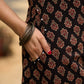 Casual and comfortable black ajrak sleeveless kurta with coordinated pants (Sleeves Provided) - Stole Optional