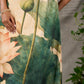 Statement Cream lotus motif dress with earthy olive accents.