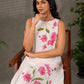 White and pink bougainvillea printed statement dress with pearl embellishments and pink accents