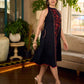 Black bias-cut block print halter dress with a red jaal hand block printed front panel, golden print detailing, and red accents for a striking, elegant statement look.