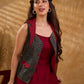 Sharp dark teal and maroon checkered sleeveless jacket with a distinctive notch collar and princess-cut tailoring, offering a structured silhouette ideal for elevated corporate styling.