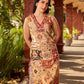 Graceful cream all-over printed kurta adorned with an overlapping maroon zardozi-embroidered neckline and bold maroon detailing.