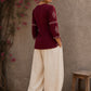 Graceful maroon hand block print top featuring timeless paisley motifs, delicate borders, and an elegant V-neck silhouette, crafted for effortless everyday sophistication.