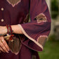 Elegant wine-purple Ikat dress with flowy sleeves, finished with a belt for a softly cinched silhouette.