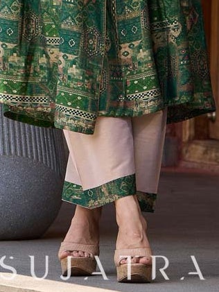 Rich bottle green printed Angrakha with a finely hand-embroidered neckline and soft beige accents.