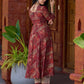 Exquisite deep maroon printed kurta with a graceful bias silhouette, intricate handwork on the yoke, and scalloped sleeve detailing.