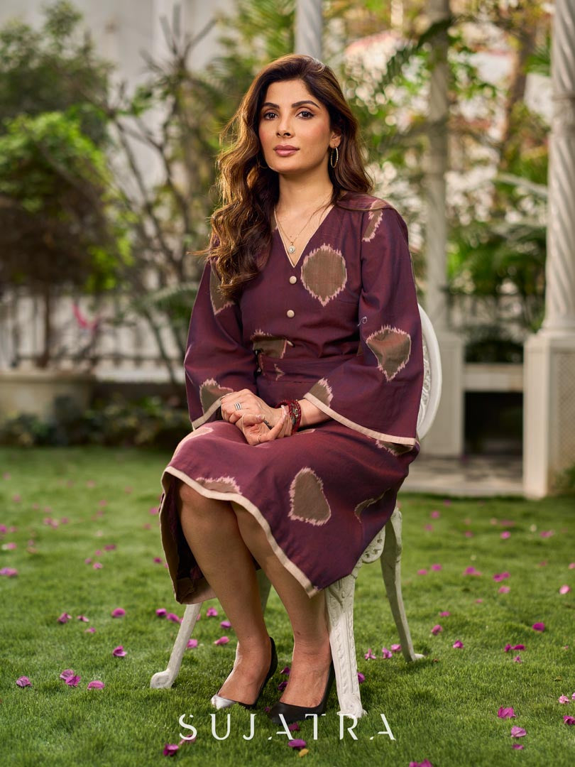 Elegant wine-purple Ikat dress with flowy sleeves, finished with a belt for a softly cinched silhouette.
