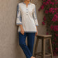 Elegant ivory hand block print top featuring intricate navy blue paisley sleeves, refined contrast detailing, and graceful pintucks, blending artisanal craftsmanship with timeless everyday sophistication.