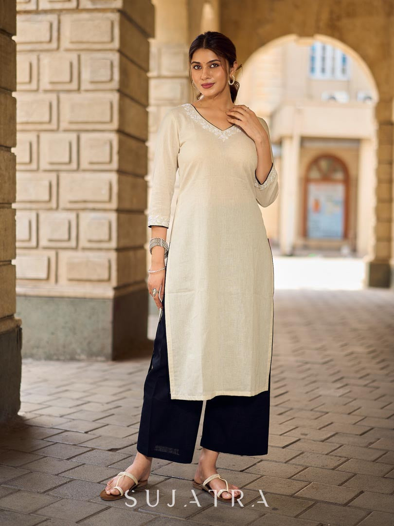 Pristine Off-White Cotton Flex Straight Kurta Featuring Subtle Monochrome Embroidery on Neckline & Sleeve Cuffs