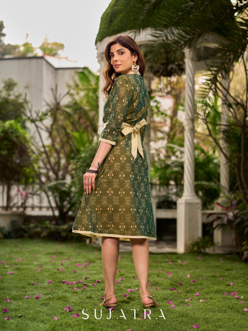 Statement olive green two-tone Ikat dress elevated with cream?gold accents, a structured belt for definition, and a subtle left-front slit.