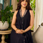 Modern black bias-cut dress showcasing unique artisan-inspired Kalamkari neck trim.