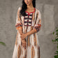 Heritage Pichwai inspired abstract cow motifs dress with red details