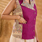 Elegant Madhubani jacket featuring magenta panels, asymmetrical closure, and a notch collar, enhanced with matching accents for a clean, tailored silhouette ideal for elevated corporate wear.