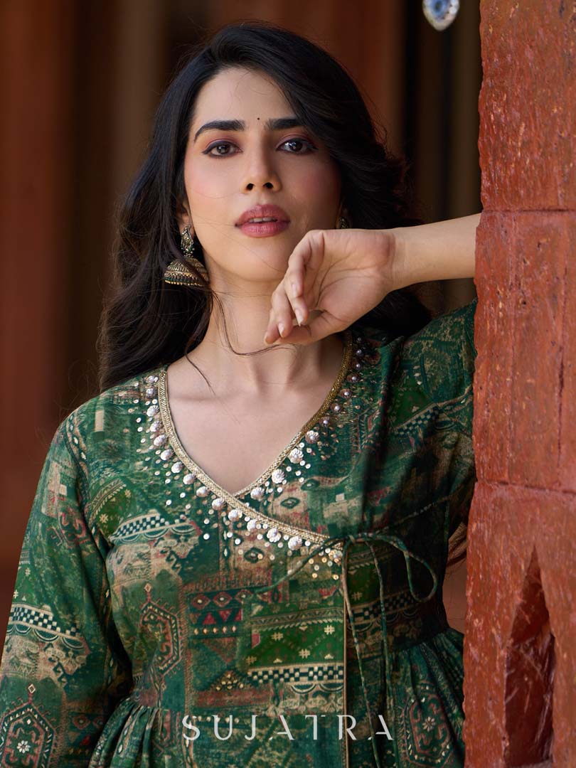 Rich bottle green printed Angrakha with a finely hand-embroidered neckline and soft beige accents.