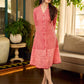 Peach and red block print stripe-floral shirt dress with fusion hand block printed stripes and jaal, a notch collar, and coordinated red accents for a vibrant, contemporary look.