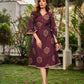 Elegant wine-purple Ikat dress with flowy sleeves, finished with a belt for a softly cinched silhouette.