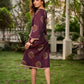 Elegant wine-purple Ikat dress with flowy sleeves, finished with a belt for a softly cinched silhouette.