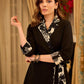 Chic black overlapping blazer-style wrap dress featuring printed black-and-white collar, cuffs, tie detail, and subtle accents