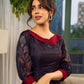 Elegant black Kalamkari-inspired dress with deep maroon accents and graceful floral motifs.