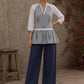 Soft blue Jaipur hairline stripe top featuring Hakoba raglan sleeves and a flattering gathered waist silhouette.