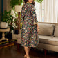 Classic bottle green Kalamkari printed dress with a beige elegant pintuck detailing.