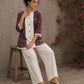 Deep red Jaipur floral printed top featuring maroon pintuck yoke, off-white panel, and scalloped lace detailing.