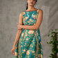 Green peacock motif printed dress with straight neckline and orange accents