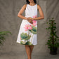 Graceful White lotus printed dress with elegant olive accents.