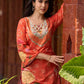Elegant orange floral printed kurta with hand-embroidered sequin and cut dana detailing on the yoke and rich maroon accents.