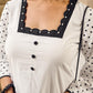 Effortless White Cotton Kurta Adorned with Polka Dot Sleeves & Delicate Scalloped Neckline
