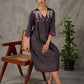 Black Ajrakh printed dress with pleats, maroon accents, and silver embellishments.