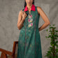 Bottle green Madhubani printed dress with vibrant magenta accents.