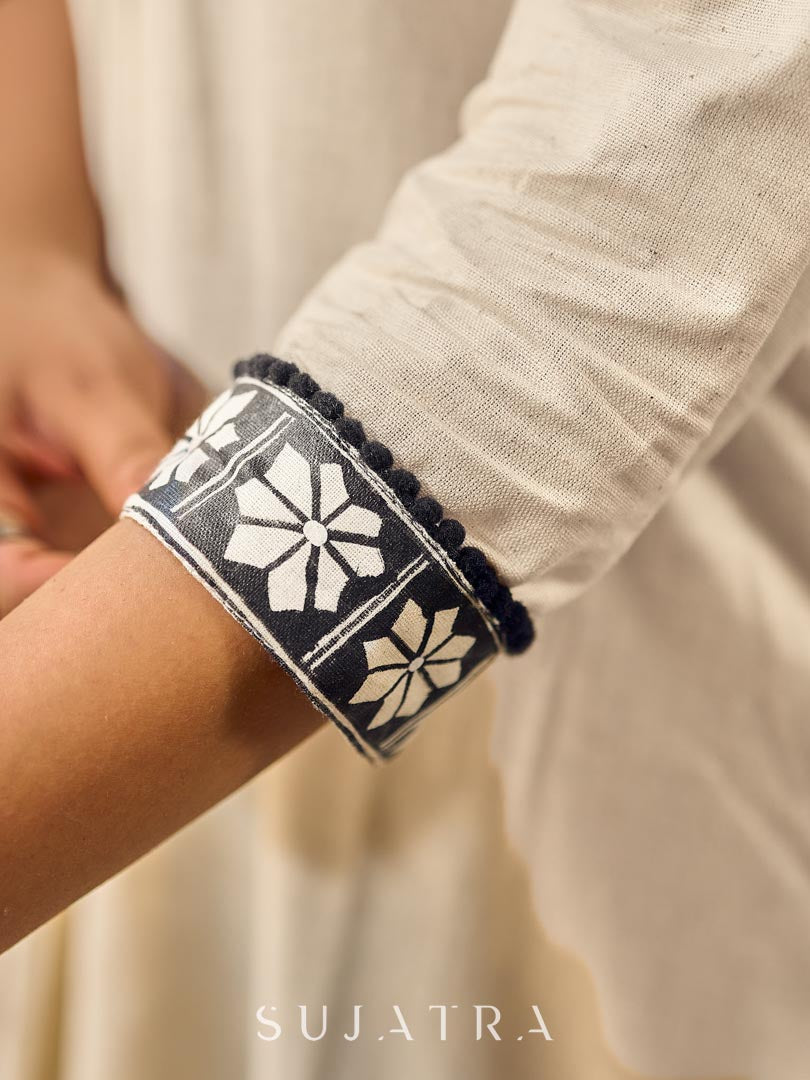 Timeless Off-White Cotton Kurta Featuring Hand Painted Warli Folk Art Yoke & Cuff Band