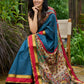 Elegant striped cotton saree in teal, enriched with hand-painted Kalamkari pallu