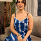 Beautiful blue shibori tie dye slip dress featuring handcrafted patterns and elegant lace accents.