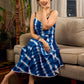 Beautiful blue shibori tie dye slip dress featuring handcrafted patterns and elegant lace accents.