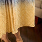 Dreamy grey-to-yellow ombré dress featuring delicate hakoba and graceful pleated detailing.