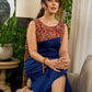 Artisan navy and maroon Kalamkari dress with bold asymmetrical neck detailing.