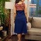 Artisan navy and maroon Kalamkari dress with bold asymmetrical neck detailing.